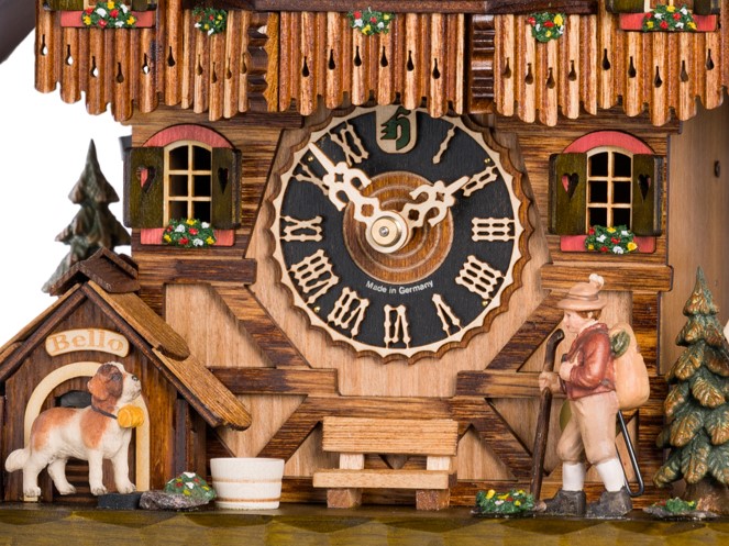 scène champêtre sur une horloge coucou musicale